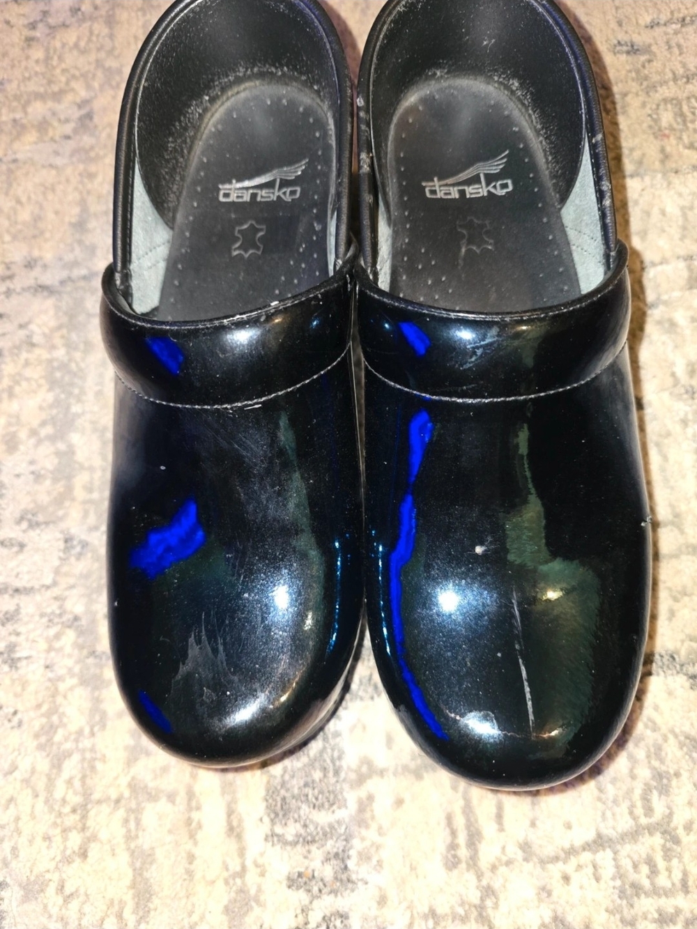 Dansko Black Patent Slip-On Clog with Blue Sheen